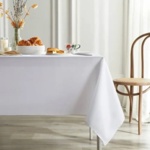 White tablecloth linen rental Calgary event table setup